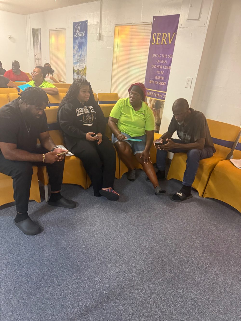 Church members seated together in the sanctuary during a weeknight Bible study